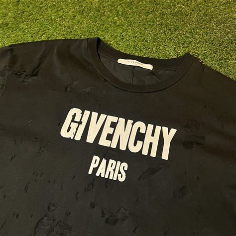 givenchy ripped top|Givenchy top with holes.